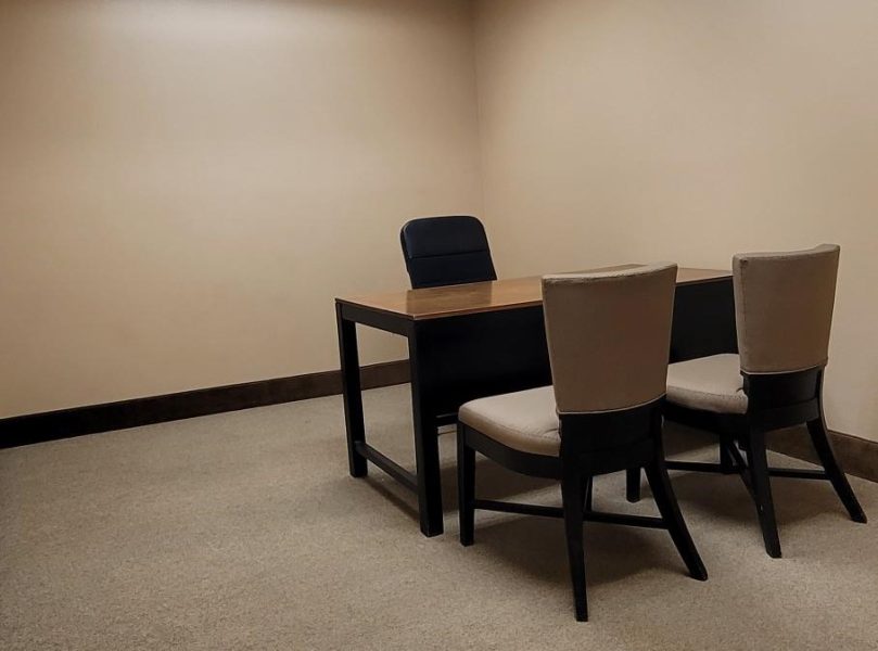 a table and chairs in a room